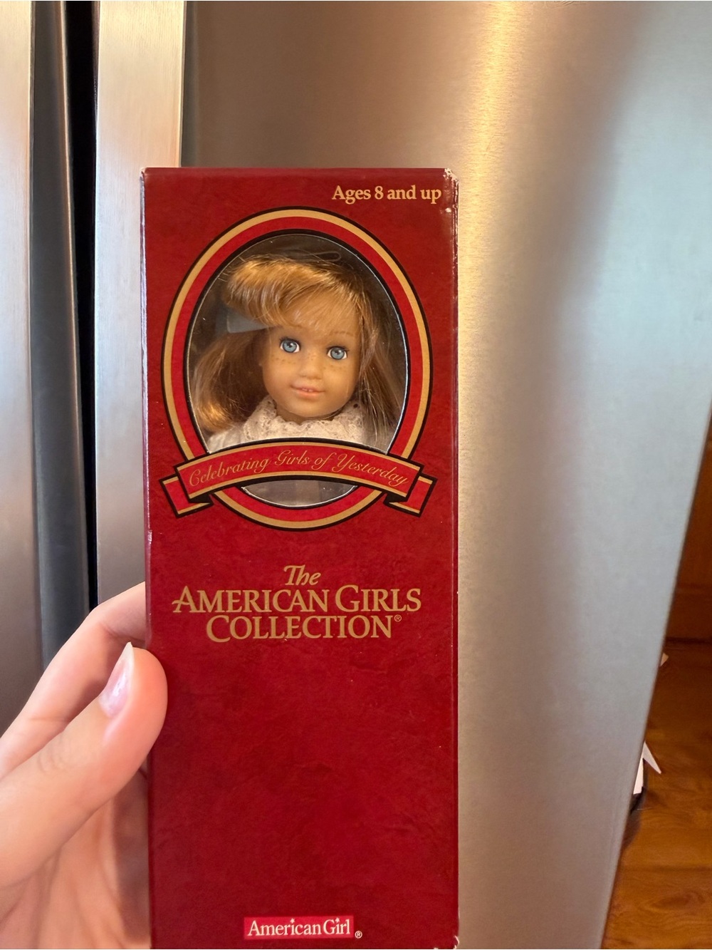 American Girl Doll with Blue Eyes and Blonde Hair in Red Box - Picture 2 of 3